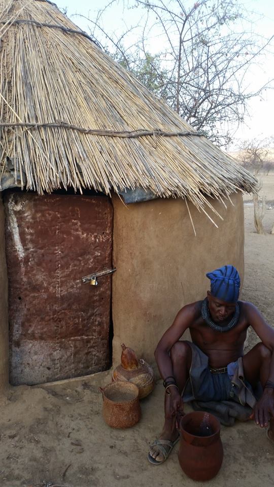 Head of the homestead outside his dwelling