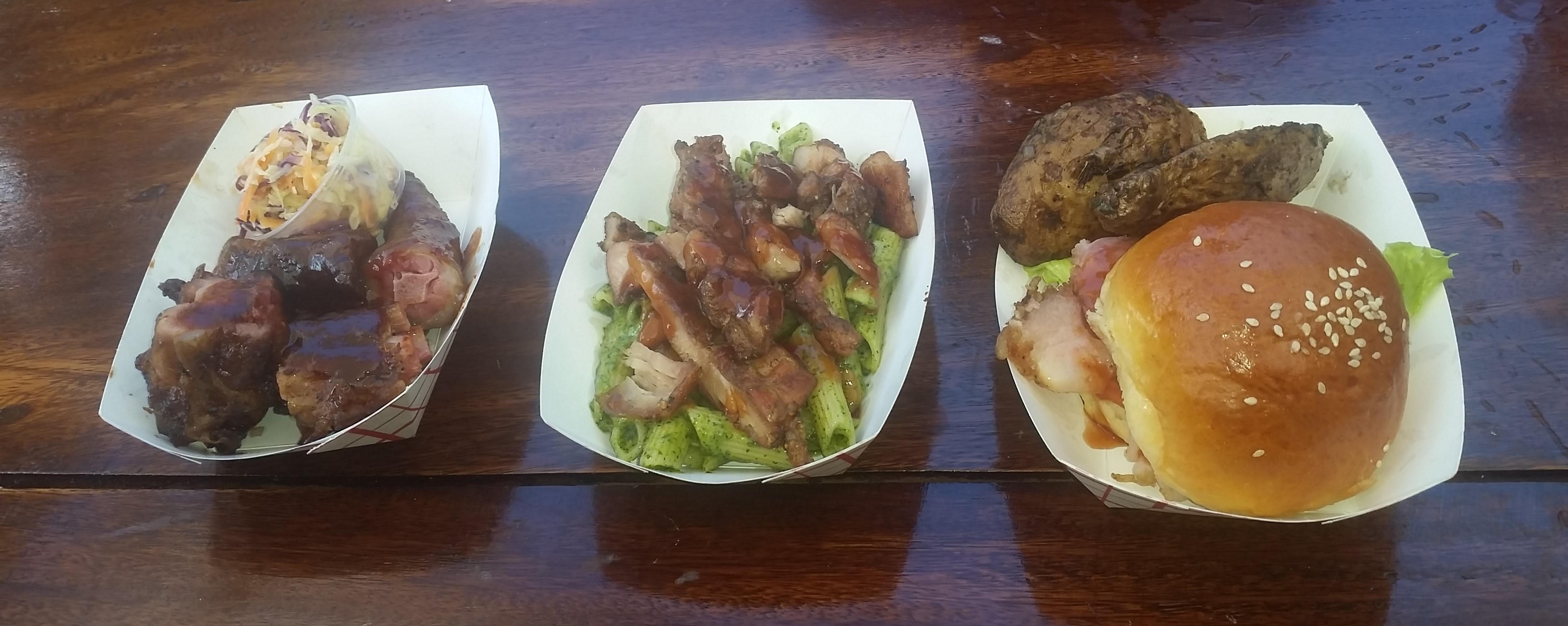 (L-R) Tamarind Glazed Pigstail, Pan Chicken and Garlic Noodles, Jerked Corn Pork Slider and Jerked Potato Wedges